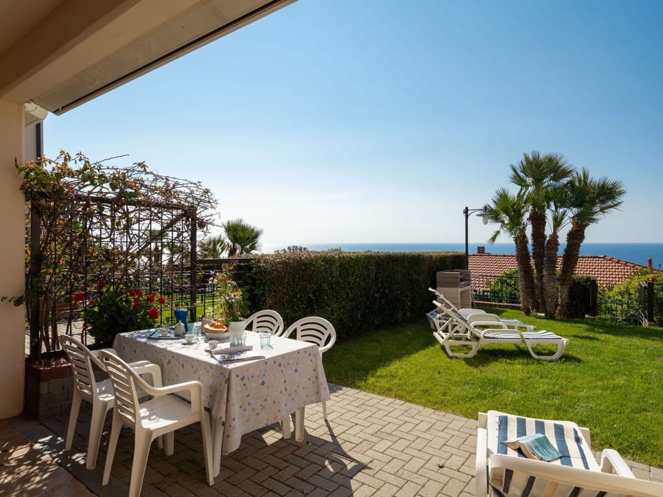 Sky, Plant, Table, Furniture, Chair, Outdoor Table, Outdoor Furniture, Shade, Interior Design, Building