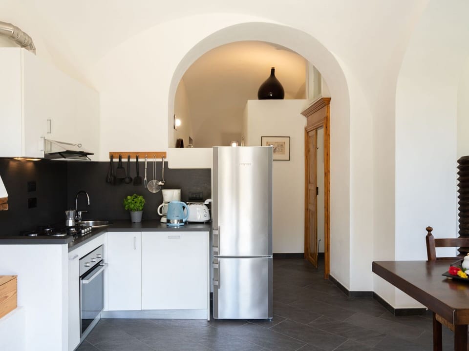 Water, Table, Tableware, Property, Sky, Furniture, Building, Window, Blue, Chair