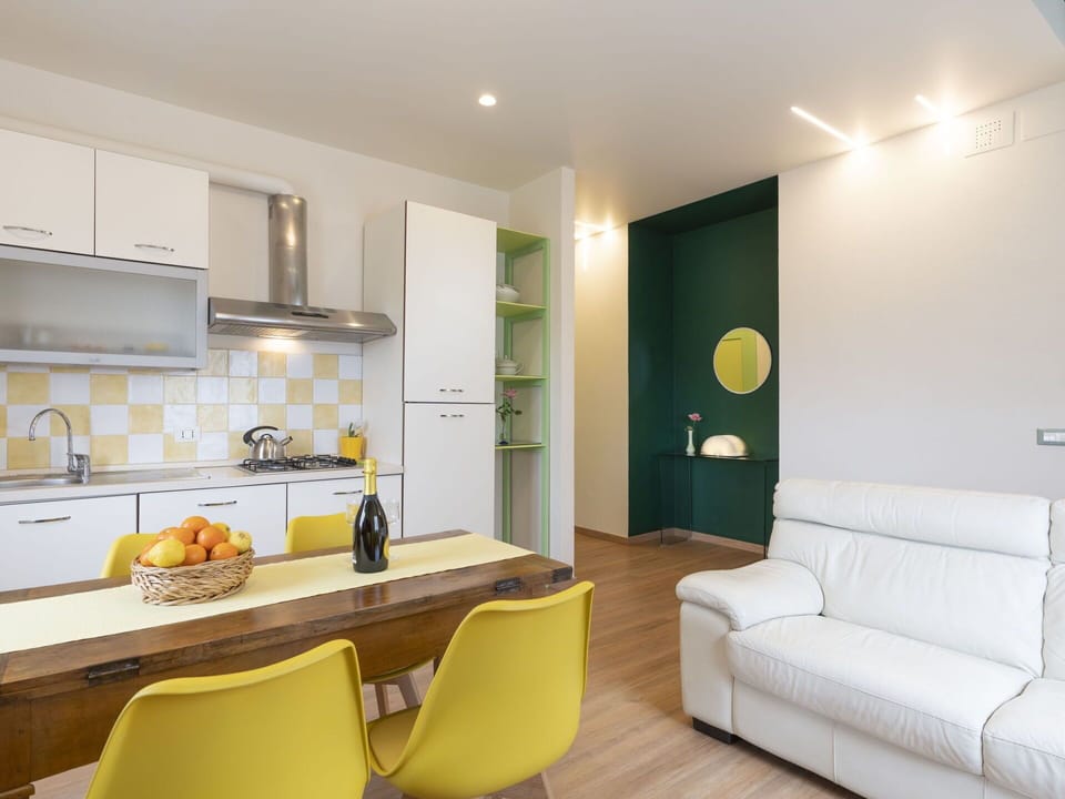 Furniture, Property, Cabinetry, Countertop, Table, Couch, Orange, Interior Design, Yellow, Floor