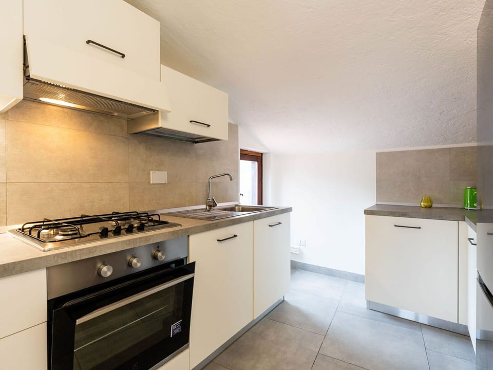Kitchen, Interior Design, Countertop, Flooring, Wood, Ceiling, Kitchen Appliance, Major Appliance, Cabinetry, Room