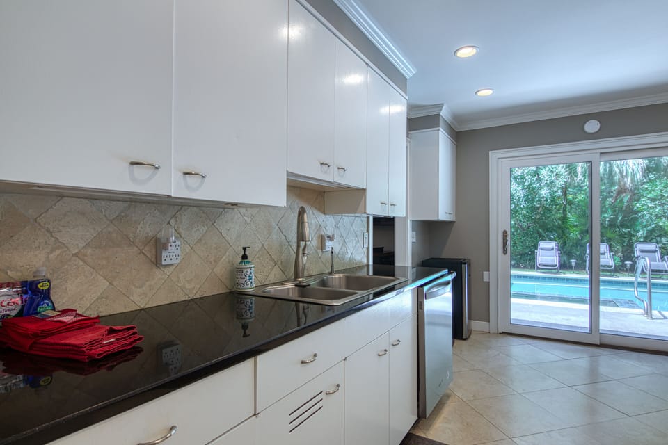Kitchen with pool just a few steps away.