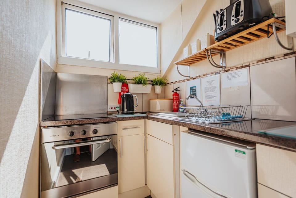 Apt 5 kitchen maybe small but offers everything you need on holiday