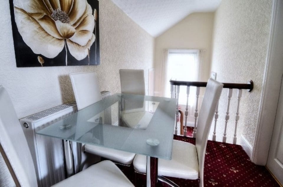 Modern dining table with four chairs