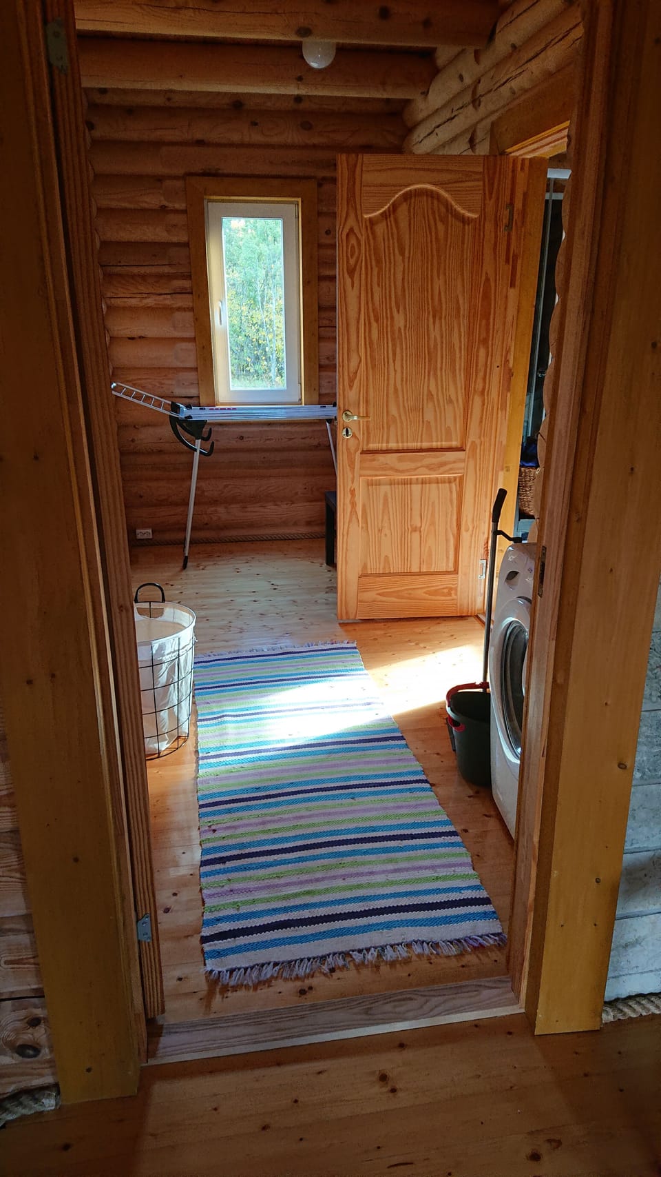 Laundry room with washing machine