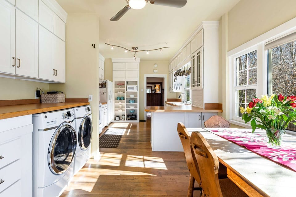 full size washer and dryer conveniently located in the breakfast nook
