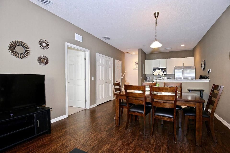 Dinning room with table for 6 people and smart tv