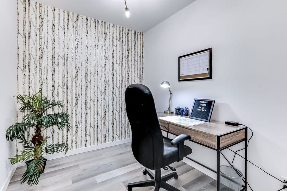 Den with office desk and chair.  Great for business travelers!
