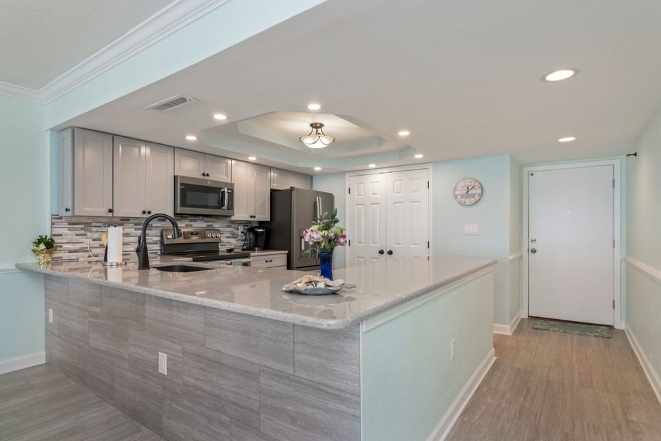 Open Kitchen with all stainless appliances