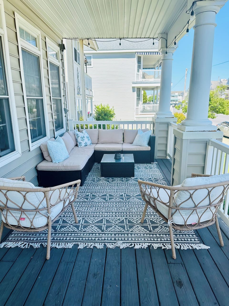 Huge wraparound porch with 3 seating areas and beautiful breezes