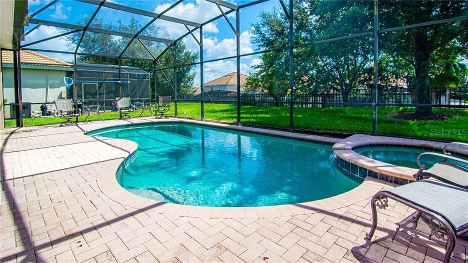 Hot Tub and Pool in the house! And there's a grill ready for cooking