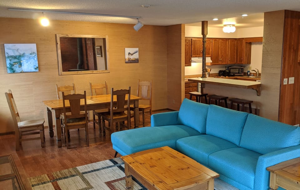 Open concept kitchen, dining and living room. 