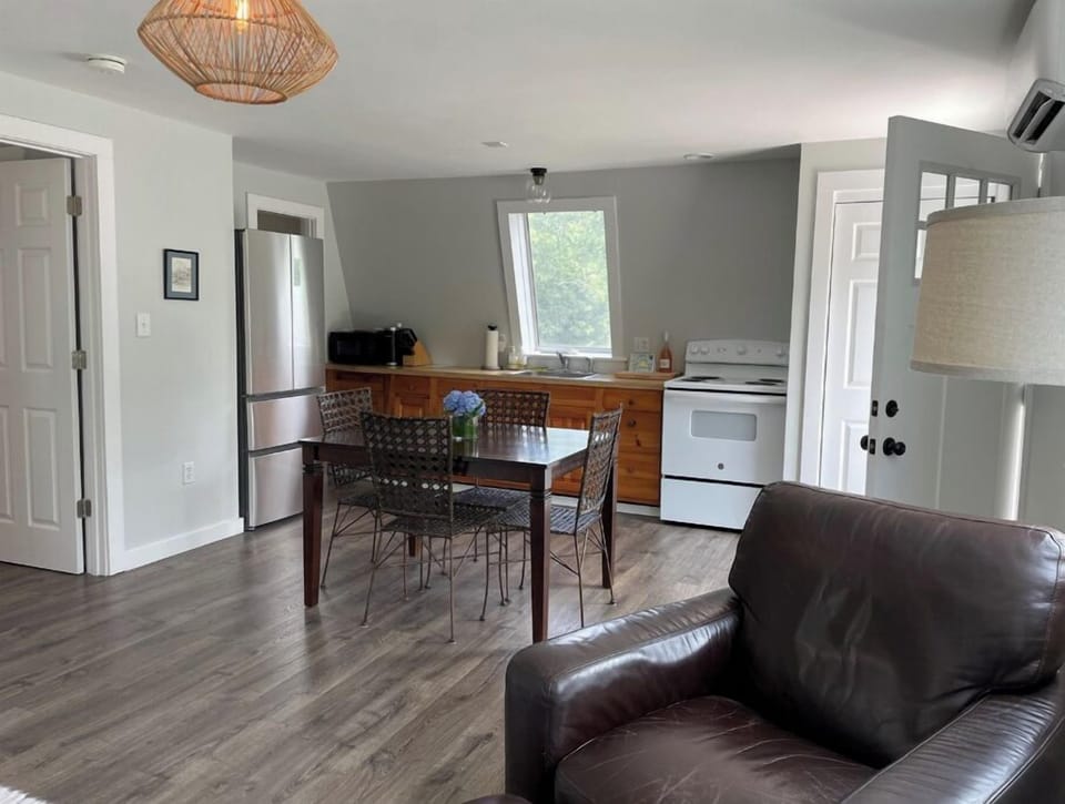 Open living space with galley kitchen 