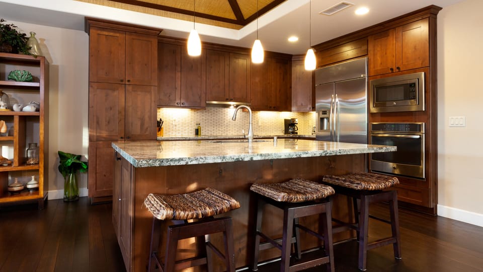 Spacious gourmet kitchen with additional island seating