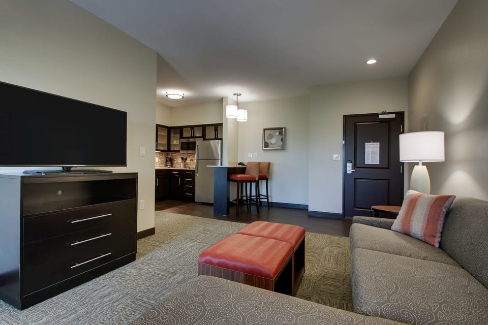 Snuggle up with a cup of coffee or tea on the comfortable sofa.