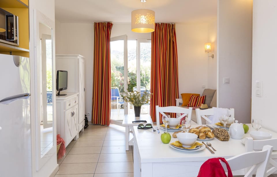 Settle into the dining area and enjoy a nice meal.