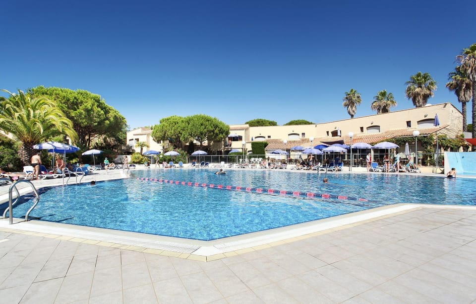 Take a dip in the pool after a day of fun.