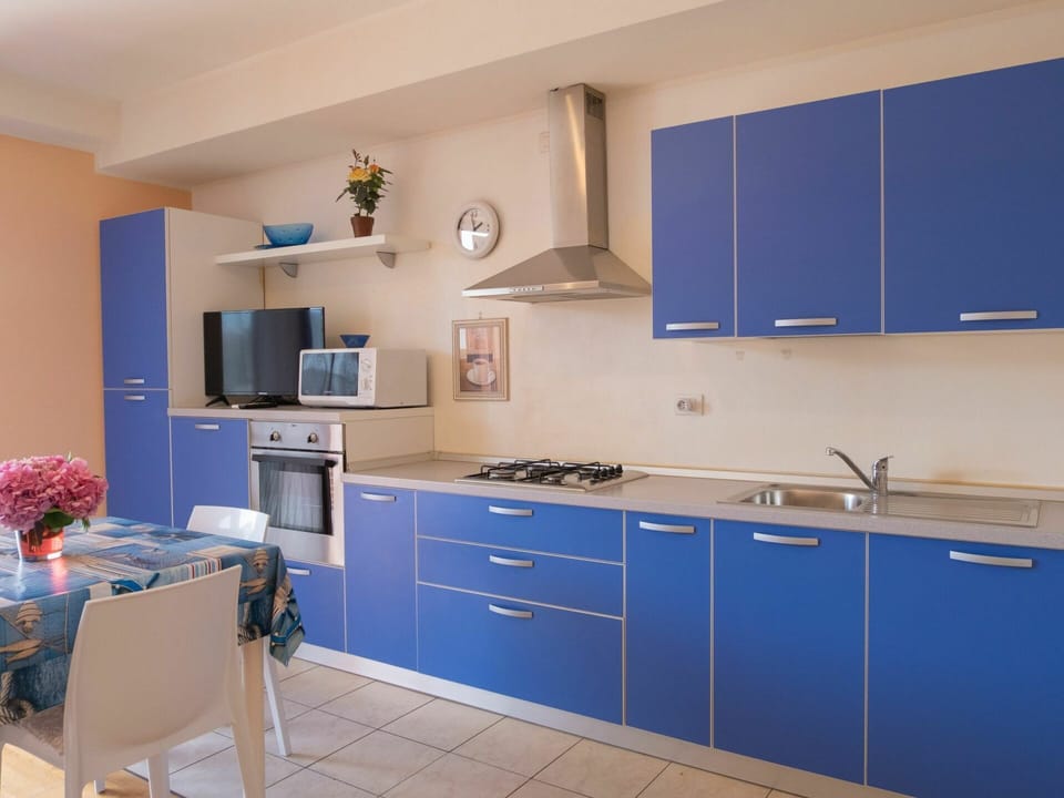 Cabinetry, Furniture, Countertop, Property, Kitchen Sink, Tap, Blue, Sink, Building, Kitchen Stove