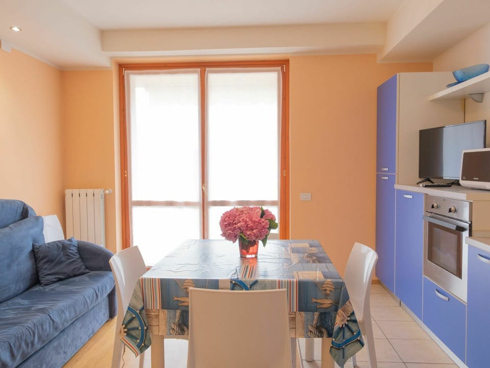 Table, Furniture, Property, Flower, Building, Couch, Blue, Cabinetry, Lighting, Wood
