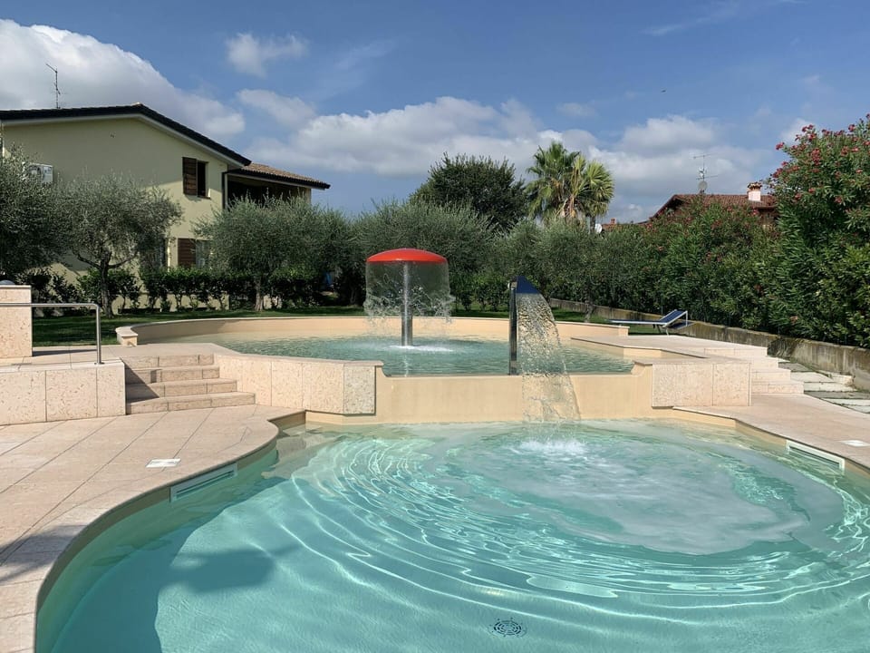 Water, Cloud, Sky, Property, Swimming Pool, Azure, Body Of Water, Tree, Plant