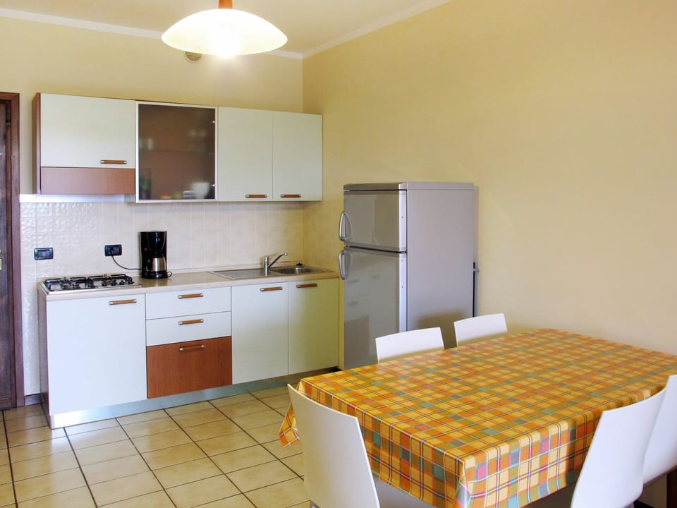 Room, Property, Furniture, Kitchen, Building, Interior Design, Floor, Yellow, Cabinetry, House