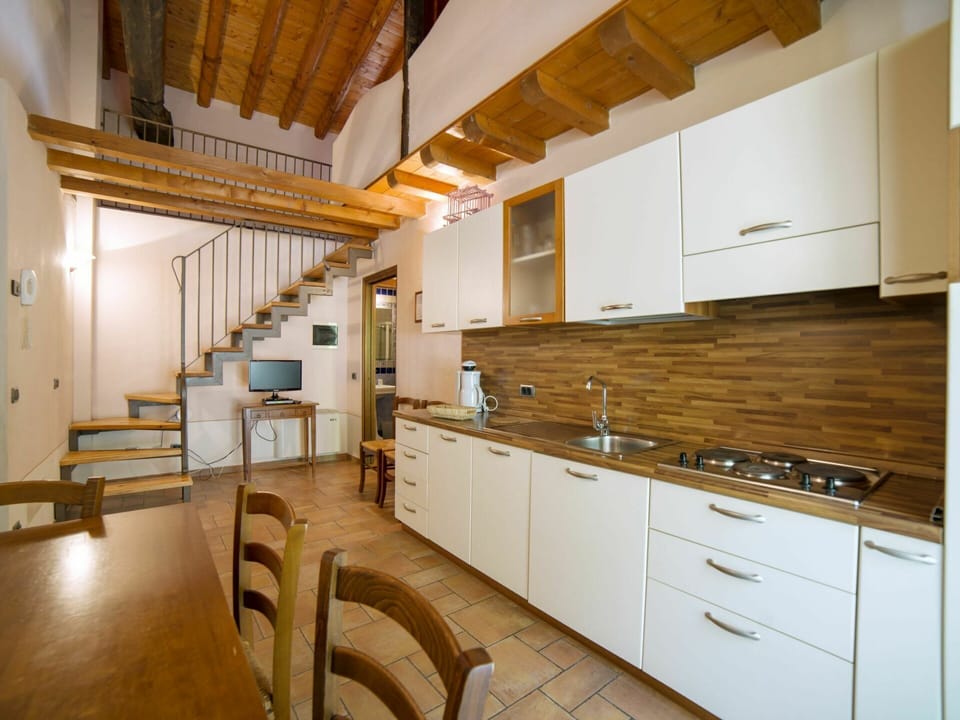 Cabinetry, Furniture, Building, Countertop, Wood, Kitchen, Drawer, Tap, House, Floor