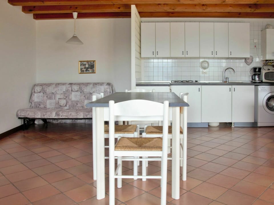 Furniture, Cabinetry, Property, Countertop, Building, Kitchen Appliance, Wood, Kitchen Stove, Interior Design, Gas Stove