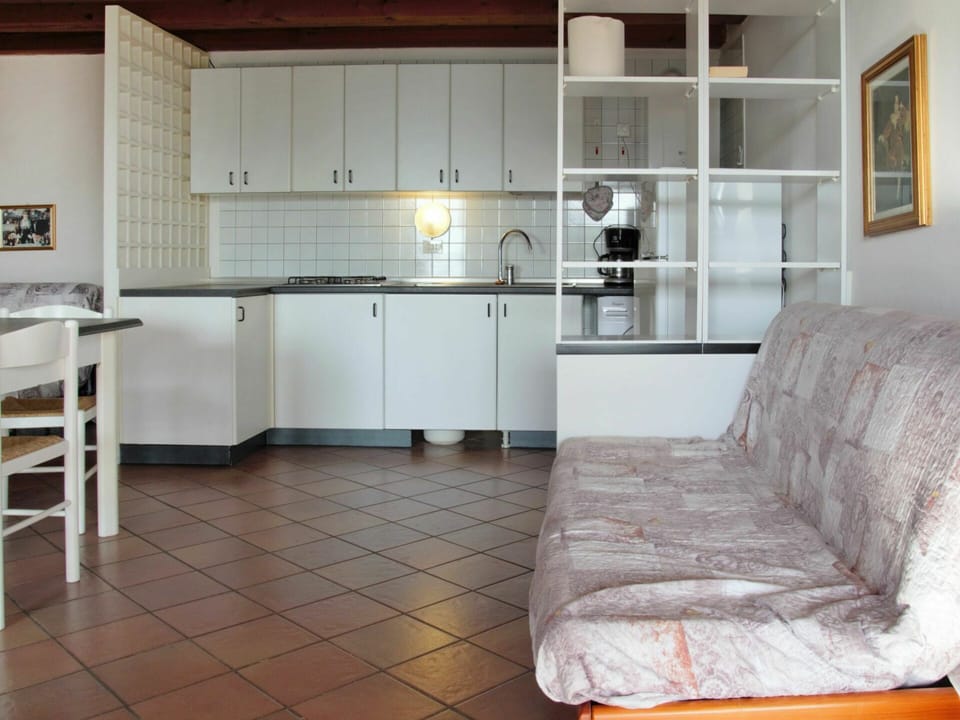 Cabinetry, Furniture, Countertop, Couch, Kitchen Sink, Kitchen Stove, Wood, Kitchen Appliance, Sink, Flooring