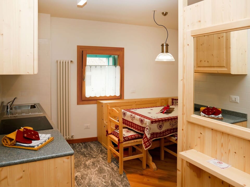 Furniture, Cabinetry, Window, Table, Wood, Lighting, Interior Design, Flooring, Floor, Kitchen