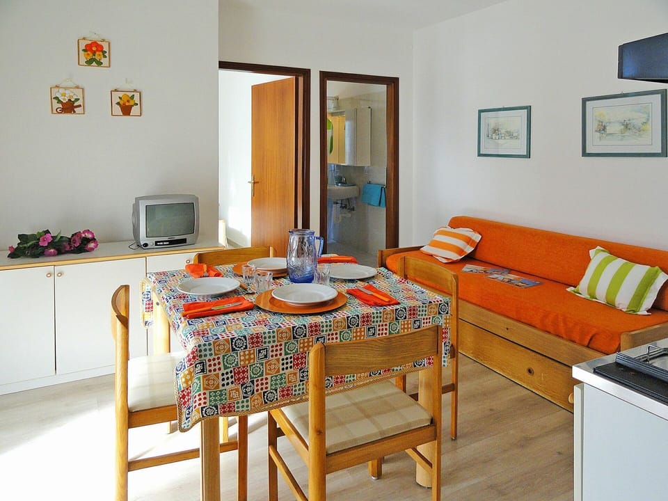 Room, Furniture, Property, Interior Design, Table, Orange, Dining Room, House, Floor, Building
