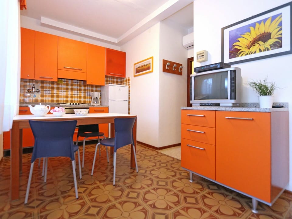 Orange, Furniture, Room, Property, Kitchen, Cabinetry, Interior Design, Yellow, Building, Real Estate