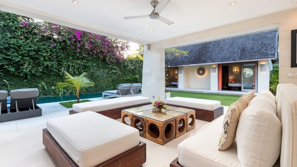 Open living area with pool view