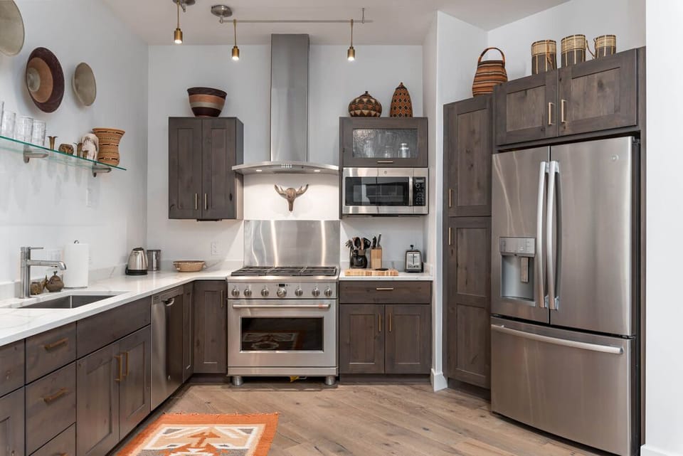 High-end kitchen with stainless appliances & thoughtful details