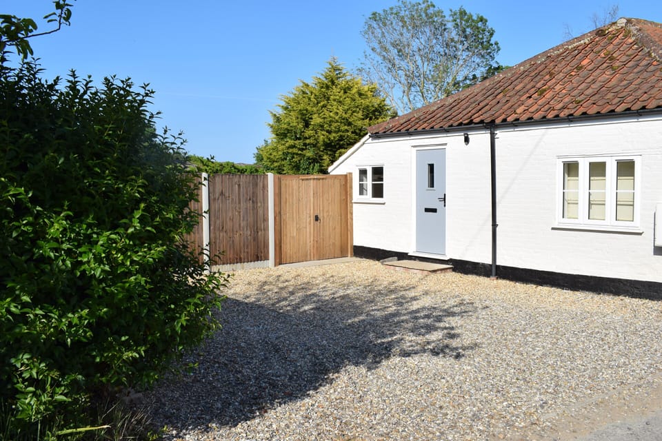 Entrance to Curlew Cottage with parking for up to two cars