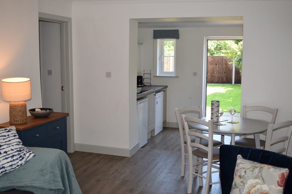 View from sitting area through to kitchen and lovely large private garden
