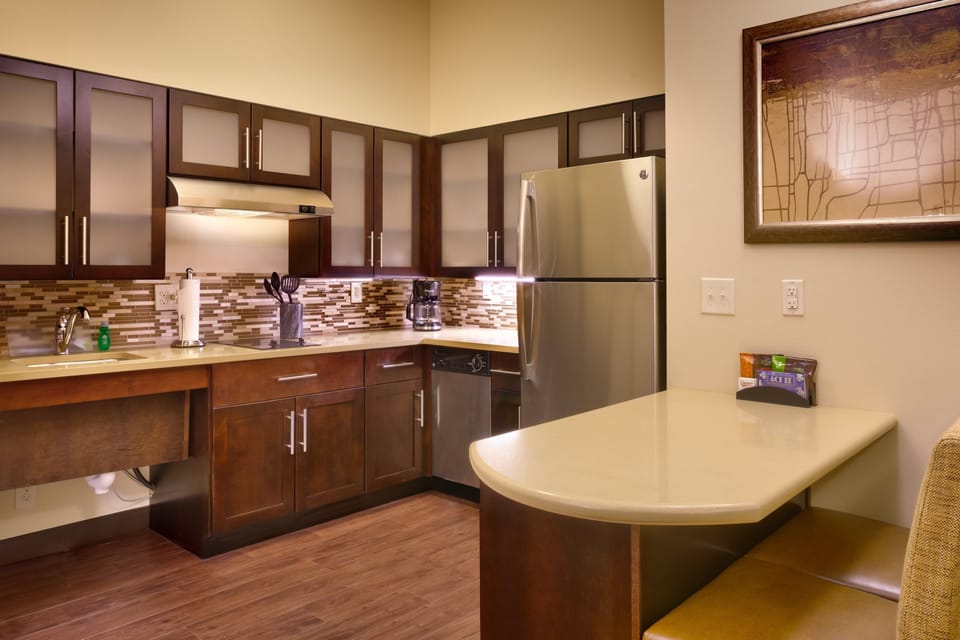 Curb your appetite by cooking a meal in your kitchen.