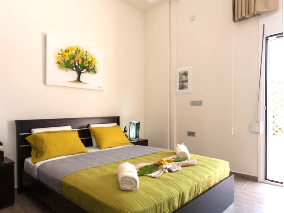Green Orange Villa ground floor master bedroom apartment overview