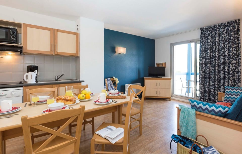 Sit down with family and friends in the dining area.