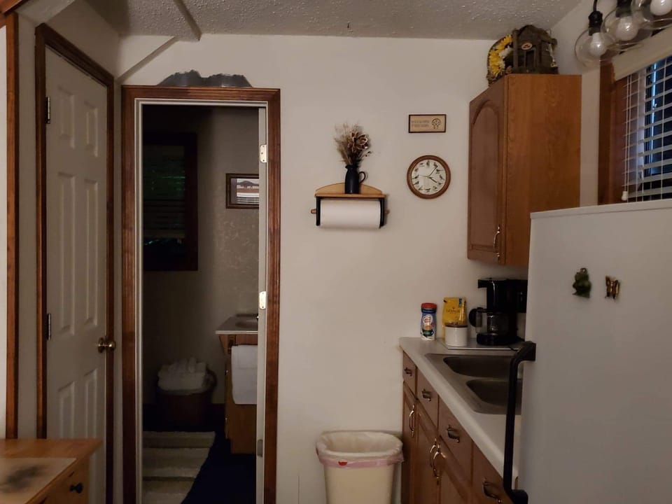 Kitchen going to bathroom.
