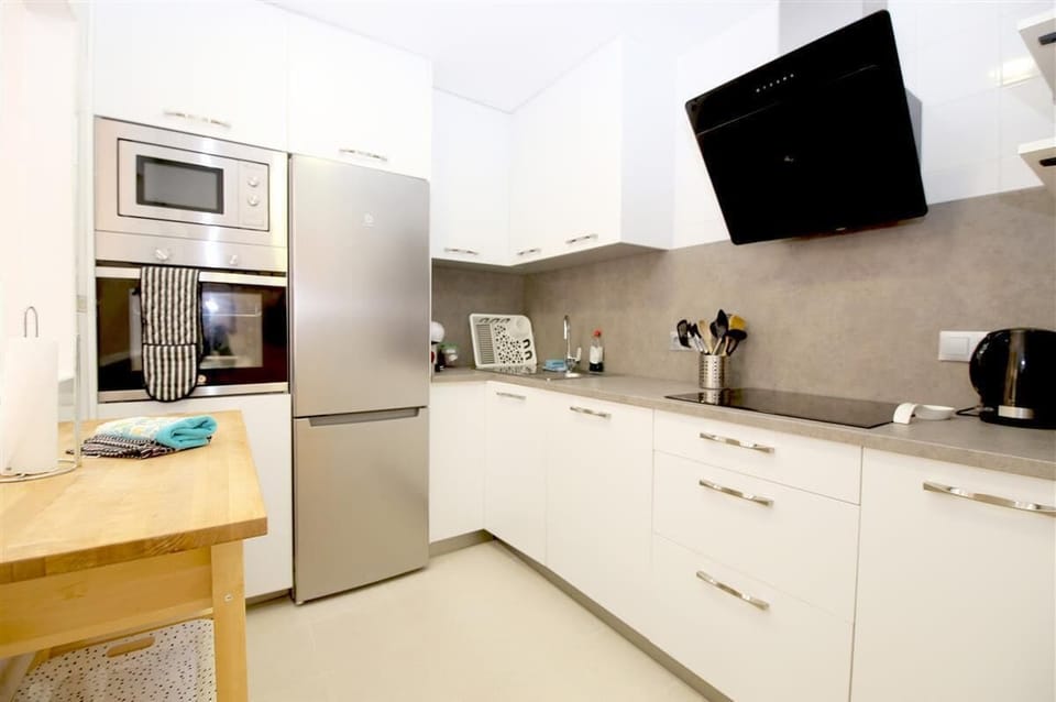 Modern kitchen is fully equipped with high-quality appliances