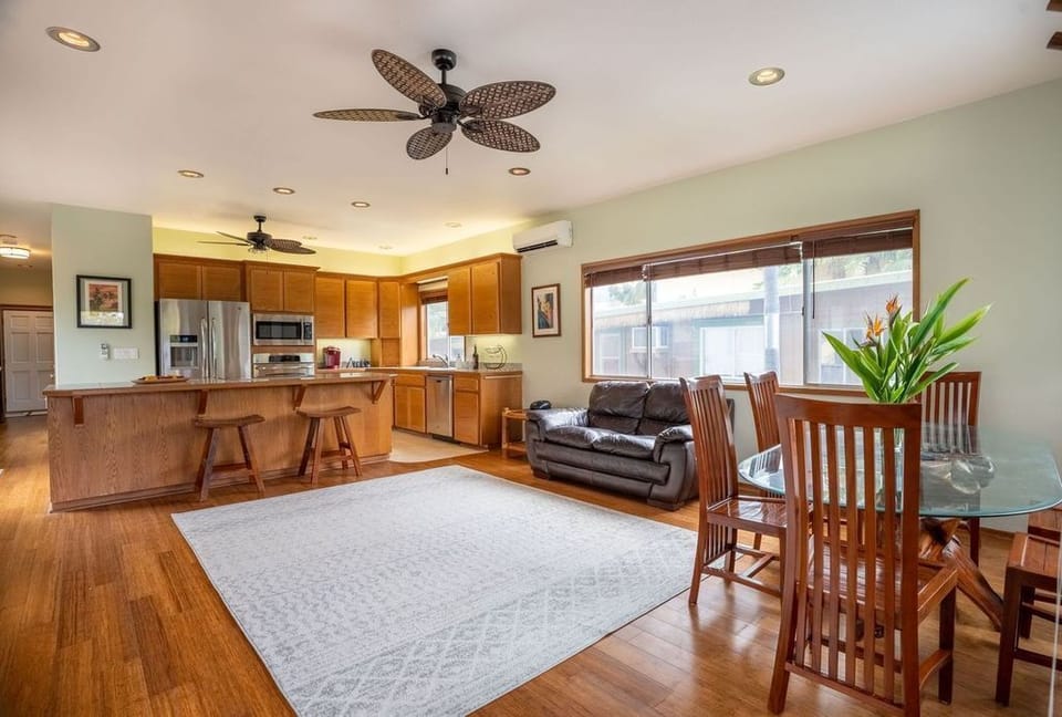 Open-concept living area & kitchen with pull out couch (different than pictured)