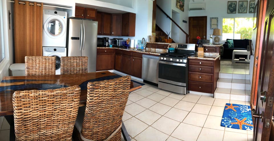 Fully stocked kitchen with gas stove/oven, washer & dryer