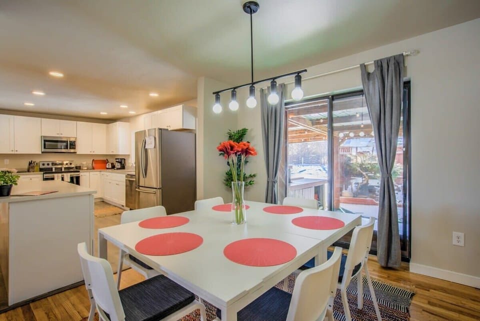 Bright open kitchen + dining – perfect for meals, coffee, and catching up.
