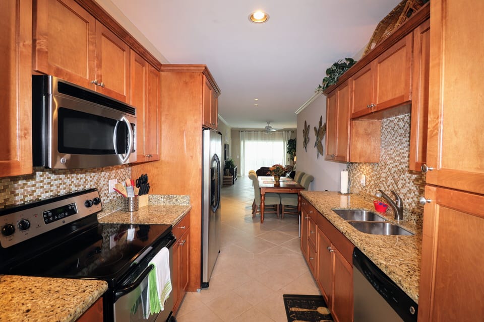 GE Stove with 4 burners cook top GE Side by side refrigerator