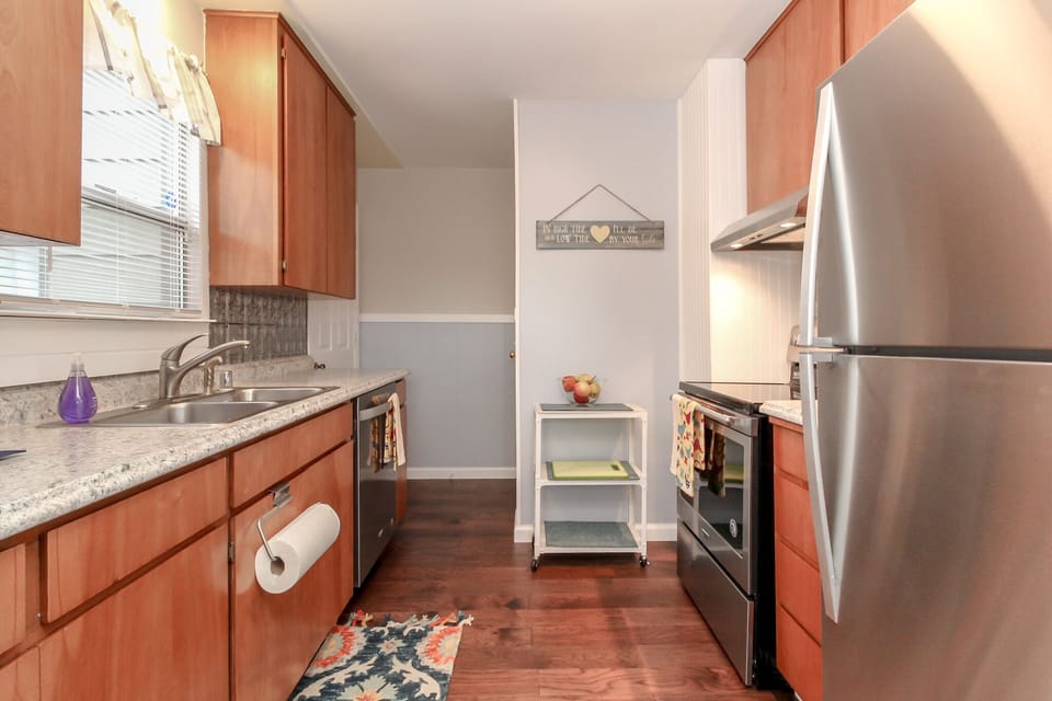 Updated kitchen with micro, full-size refrig, dishwasher and all cooking supplys