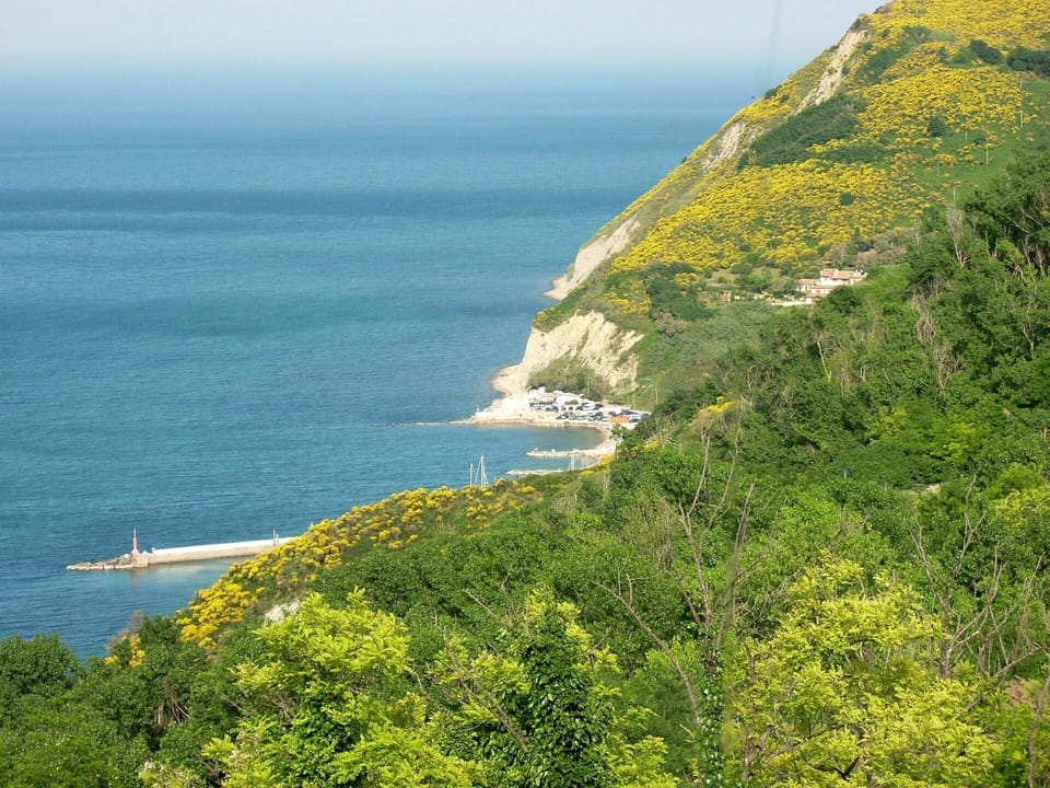 Water, Sky, Nature, Azure, Natural Landscape, Mountain, Coastal And Oceanic Landforms, Terrain, Boat, Headland