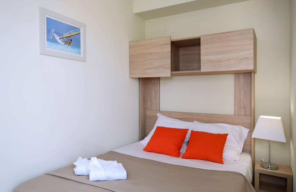 Drift to sleep in a comfortable bed after a wonderful day outside - Please note that bedding configurations vary!