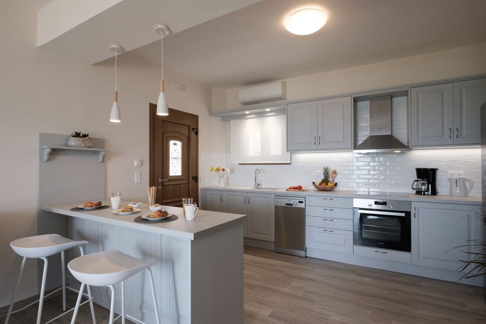 Armikes Beachfront  Suite 2 Afionas Corfu Kitchen And Dining Area 