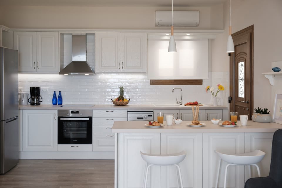 Armikes Beachfront Suite 1 Afionas Kitchen And Dining Area 