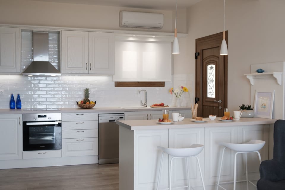 Armikes Beachfront Suite 1 Afionas Kitchen And Dining Area  