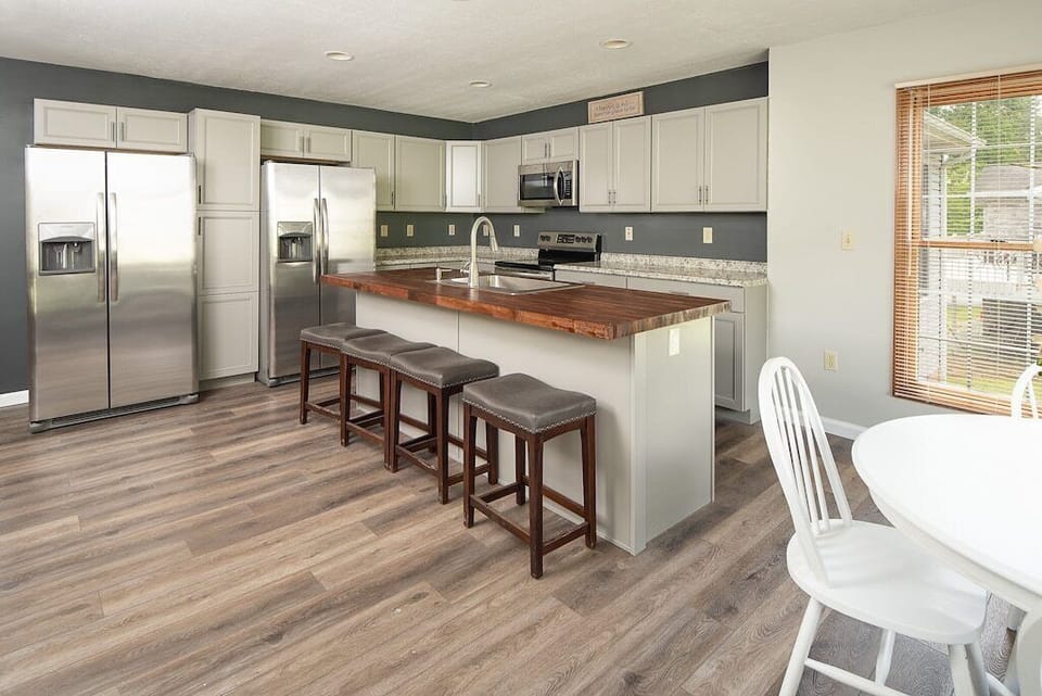 modern kitchen supplied w/ 2 frigs, 2 dishwashers, 2 toasters, 2 coffee makers..